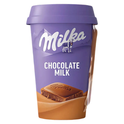 A 220ml Milka Chocolate Milk Drink cup, purple with a lid, features a chocolate piece, cow logo, and classic Milk Chocolate taste on the front.