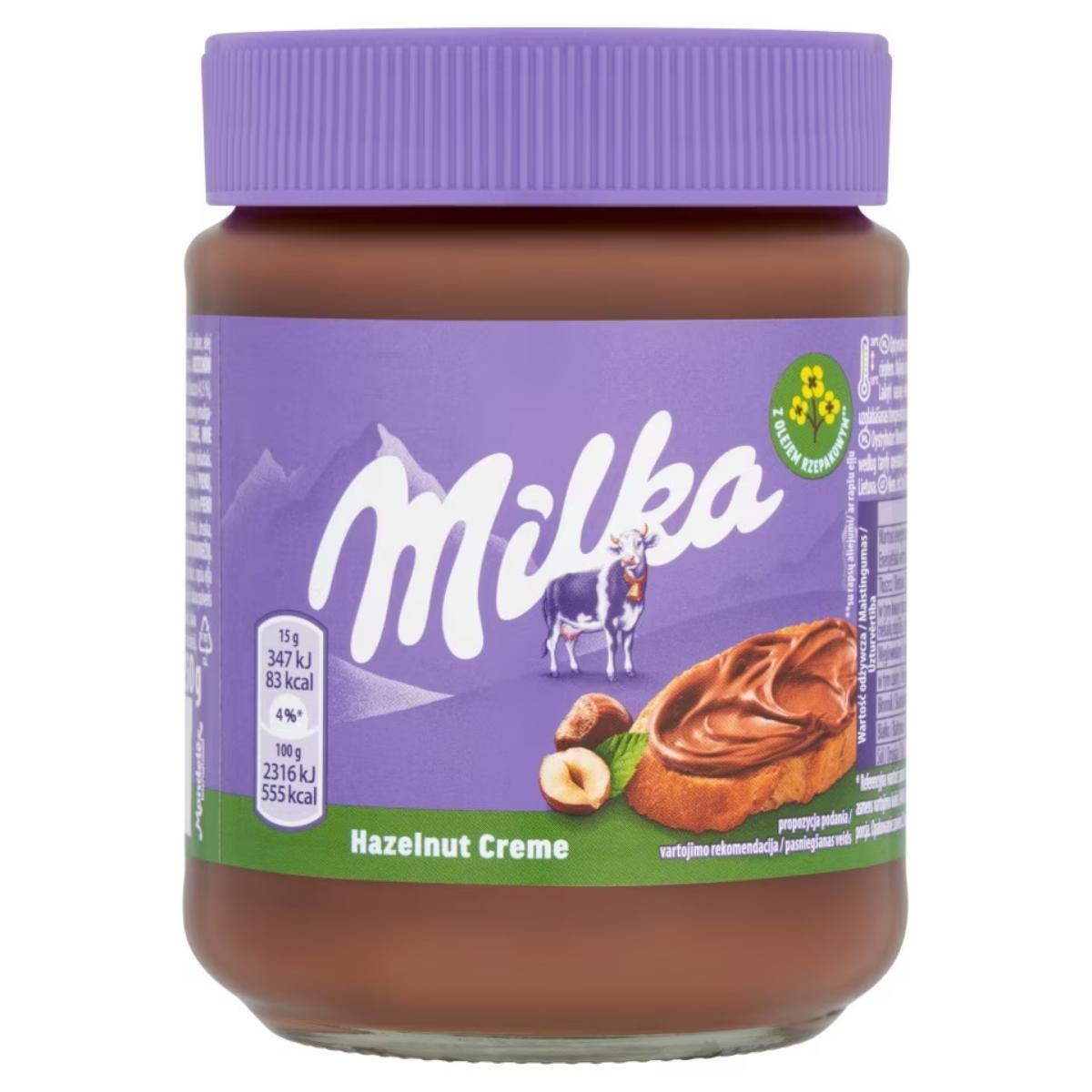 Jar of Milka Hazelnut Creme Spread - 350g, adorned with a purple lid and label, showcasing a cow image alongside nutritional information.