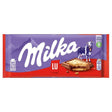 The Milka - LU Chocolate Biscuit Bar (87g) combines Alpine milk chocolate with crunchy biscuit pieces, and features a purple wrapper with the Milka logo, cow illustration, and images of the chocolate bar.