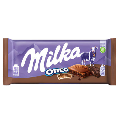 Milka - Oreo Brownie Chocolate Bar - 100g by Milka comes in signature purple packaging with a cow and mountain design, showing Alpine milk chocolate filled with Oreo cookie pieces and brownie chunks.