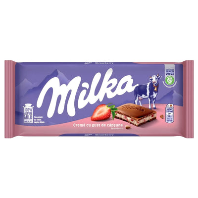 Milka - Strawberry Milk Chocolate 100g bar features a cow, strawberry, and sliced chocolate on its packaging. It highlights "Alpine milk" and "100% certified cocoa" for quality ingredients. Brand: Milka.