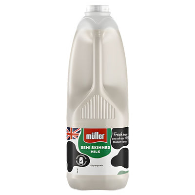 Enjoy Muller Semi Skimmed Milk - 2L, featuring a green label, British flag, and cow pattern—delicious semi skimmed milk from Muller for your daily enjoyment.