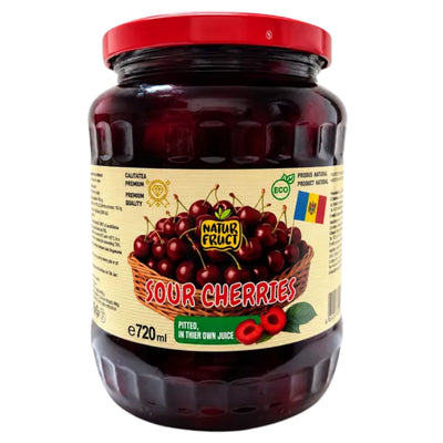 A 720ml glass jar of Natur Fruct Sour Cherries, featuring a red lid and a beige label with an illustration of fresh cherries, set against a plain white background.