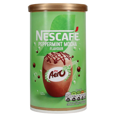 A canister of Nescafe Peppermint Mocha Flavour, featuring a green label with an illustration of a chocolate drink topped with mint leaves and drizzled chocolate, on a white background.