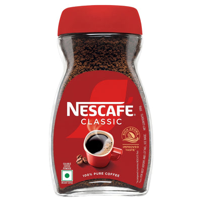 Glass jar of Nescafe - Classic Instant Coffee - 100g with a red screw-top lid and a red label featuring an image of a steaming cup of coffee.