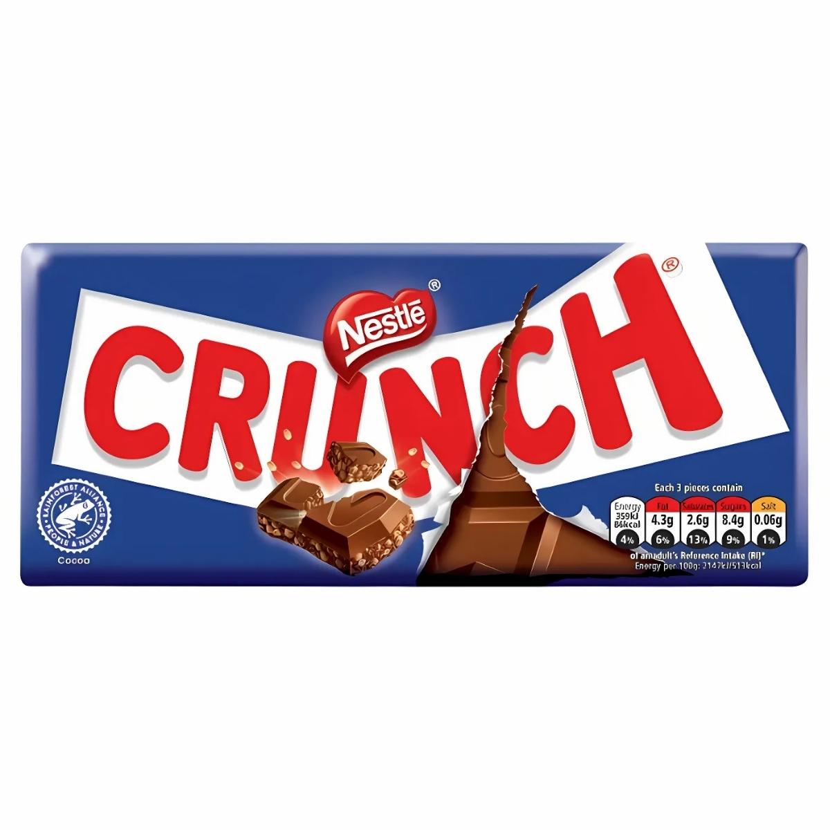 The packaging of the Nestle Crunch Chocolate Bar - 100g showcases a partially cracked milk chocolate bar with a rice crisp texture, all set against a bold blue and white backdrop.