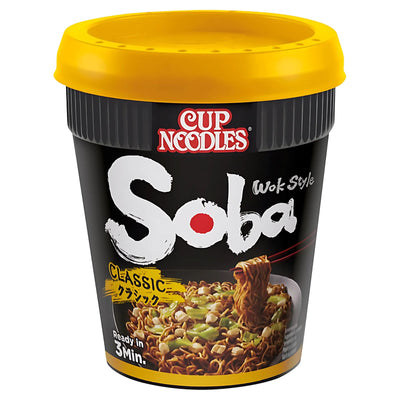 A black cup labeled "Nissin - Cup Noodles Soba Wok Style Classic - 90g" with a yellow lid, features Japanese soba noodles and vegetables. From the iconic Cup Noodles lineup, it's ready in 3 minutes.