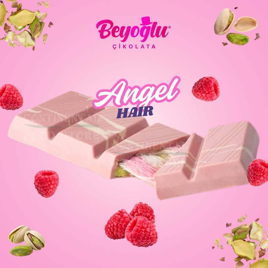 A Beyoglu Angel Hair Raspberry White Chocolate Bar Filled with Candy Floss & Pistachio Cream (170g) is shown on a pink background, topped with pistachios, raspberries, and strands of angel hair, surrounded by pistachios and raspberries.