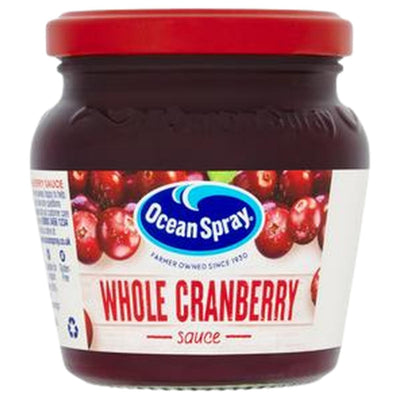 A 200g jar of Ocean Spray Whole Cranberry Sauce with a red lid and branded label, featuring whole cranberries inside.