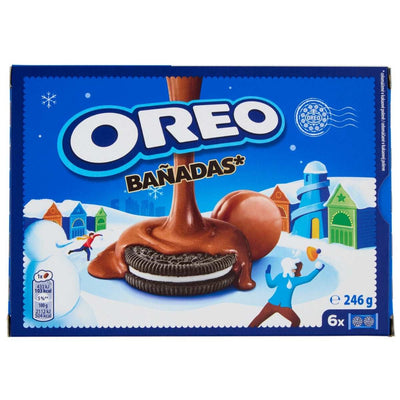 Oreo - Banadas Covered Chocolate Milk (246g) by Oreo: 6 packs of chocolate-covered biscuits with snowy-themed packaging featuring cartoon figures.