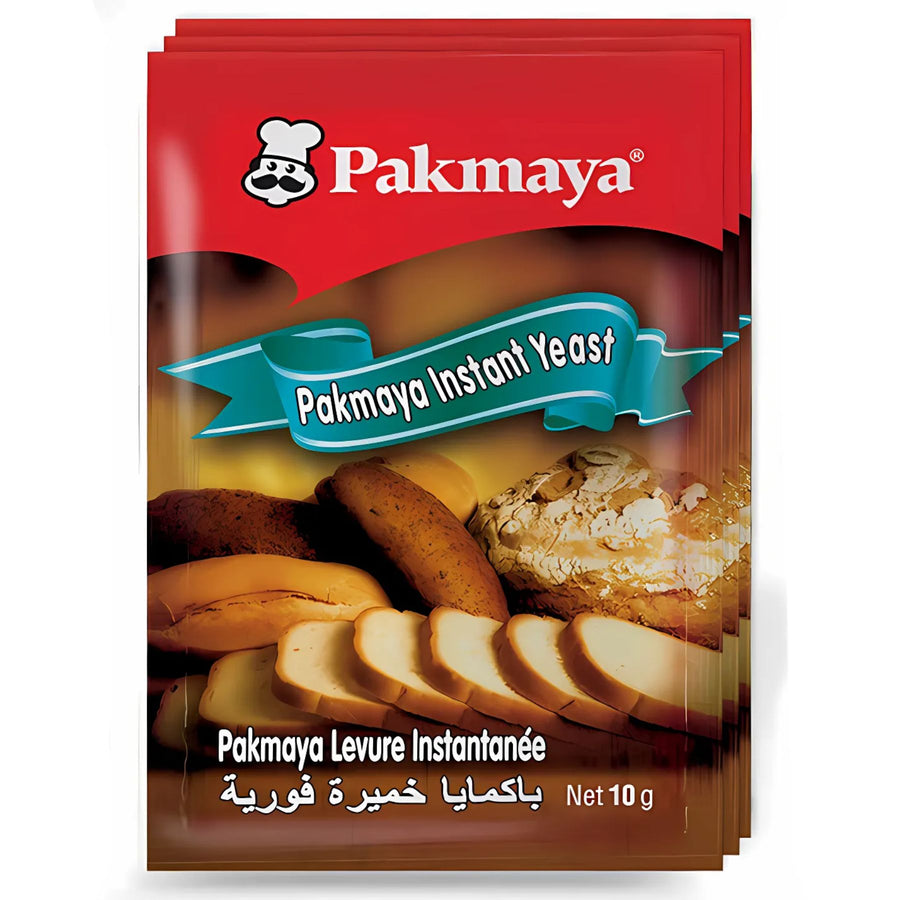 Pakmaya Instant Yeast (3 x 10g) sachets, ideal for homemade bread. The packaging shows baked goods and includes English, French, and Arabic text.
