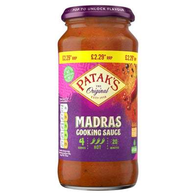 A 450g jar of Patak's Madras Cooking Sauce, a hot and vegan curry for four, with a purple lid and £2.29 RRP on the seal.