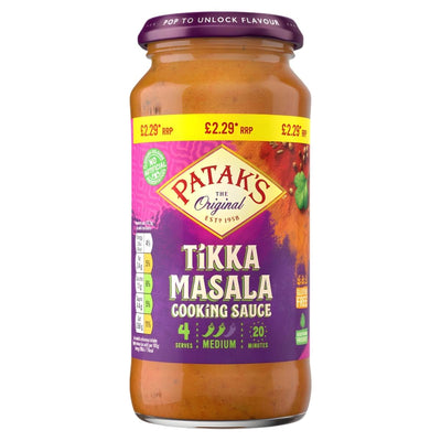 A 450g jar of Patak's Tikka Masala Cooking Sauce from Patak's, featuring a purple label and price marked at £2.29, displays details on servings, spice level, and cooking time on the front.
