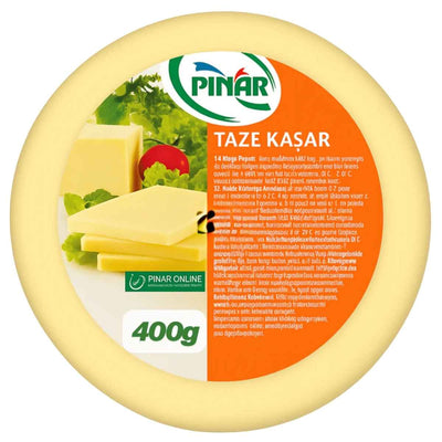 A 400g round package of Pinar Kashkaval Cheese, made from pasteurised cow’s milk, with product details and cheese slice images on the label.