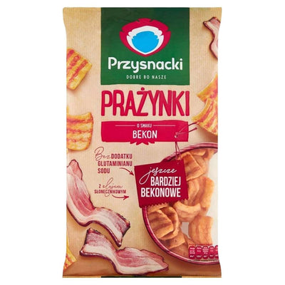 A 120g bag of Przysnacki - Bacon Flavoured Puffs Snacks, featuring bacon strip images and Polish text on the front describing these crispy, uniquely flavored bacon snacks.