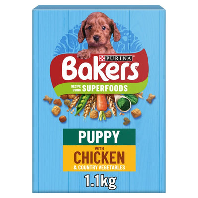 Purina Bakers Puppy Chicken & Vegetables Dry Dog Food, 1.1kg, with superfoods branding and a puppy image on a blue pack.