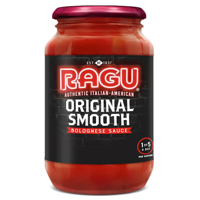 A 500g jar of Ragu Original Smooth Bolognese Pasta Sauce features a black label with branding and nutritional info, combining tomatoes and Italian herbs for a rich, smooth flavor.