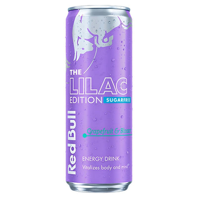 A 250ml Red Bull Grapefruit & Blossom Energy Drink can, featuring vibrant purple design with water droplets, offers a refreshing grapefruit and blossom flavor—crafted to boost mental alertness.