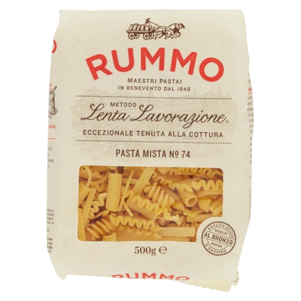 The Rummo - Pasta Mista No.74 - 500g package features unique pasta shapes visible through a clear window, adorned with elegant red and black text plus decorative elements, embodying authentic Italian cuisine.