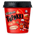 A red cup labeled "Samsam - Topokki Original (Mild) - 120g" by Samsam features a cartoon rice cake, flame graphics, and an image of the mild spicy Korean rice cake dish on its side.