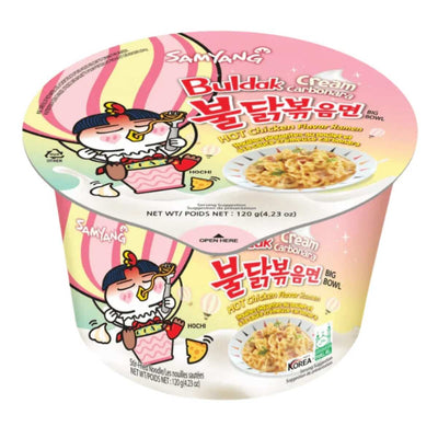 Samyang - Buldak Cream Carbonara Hot Chicken Flavour Ramen Bowl (Halal), 120g, comes in playful pink and white packaging featuring a cartoon chicken.