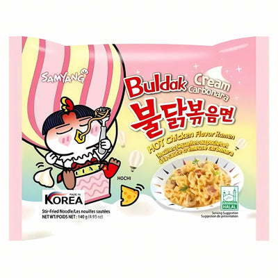 The Samyang - Buldak Cream Carbonara Hot Chicken Flavour Ramen 140g package shows a cartoon chicken eating noodles and an appetizing photo of the prepared ramen on the front.