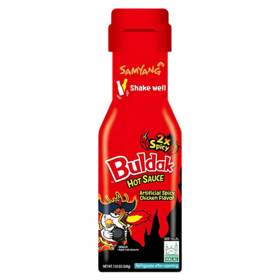 A 165ml bottle of Samyang - Buldak Extremely Spicy (2X) Hot Sauce, featuring the cartoon chicken mascot, bold branding, and a "shake well" label. Enjoy the intense heat of this iconic Samyang spicy chicken sauce!.