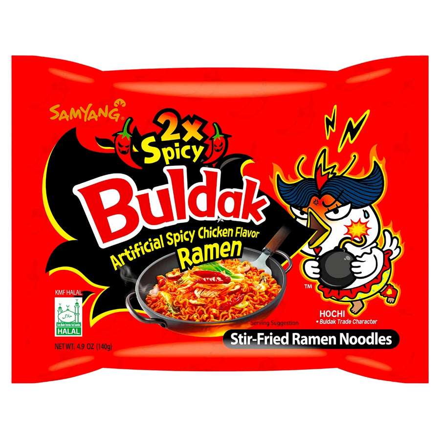 A red package of Samyang - Buldak Extreme Hot Chicken Flavour Ramen Noodles (Halal)- 140g, boasting Korean spices and 2x Spicy Artificial Chicken Flavor. The packaging features a cartoon chicken and displays a 4.94 oz weight, promising an Extreme Hot Chicken experience.
