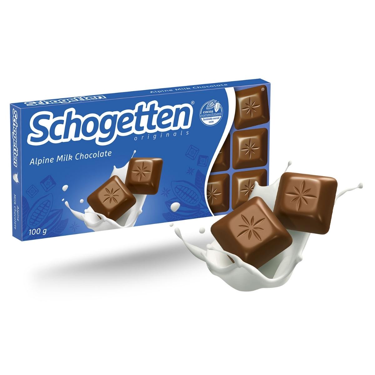 A box of Schogetten Alpine Milk Chocolate Bar (100g) features individual chocolate pieces diving into milk, all wrapped in a blue and white design, made with the finest Swiss mountain ingredients.