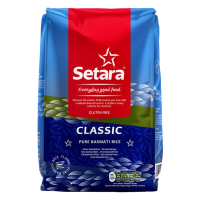A blue and red bag of Setara - Classic Basmati Rice - 5kg, labeled as gluten-free. The text promotes the rice's fluffy texture, aromatic flavor, and long grain, perfect for use in a variety of cuisines.