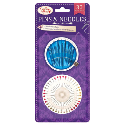 The Sewing Box - Pins & Needles - 30 Needles set includes premium needles in a blue round dispenser and multicolored headed pins on a purple card—a perfect addition to your sewing kit from Sewing Box.