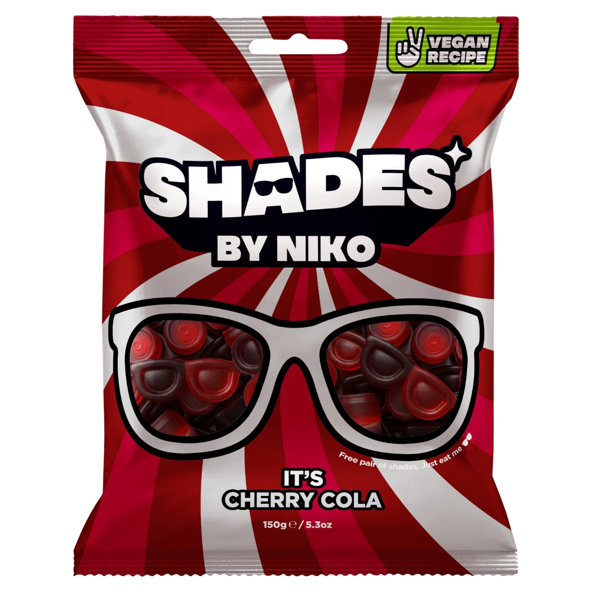 A bag of Shades by Niko It's Cherry Cola gummy candy. The packaging features a bold red and white sunburst design with a graphic of white sunglasses filled with dark red cherry-shaped gummies.