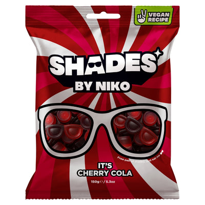 A bag of Shades by Niko It's Cherry Cola gummy candy. The packaging features a bold red and white sunburst design with a graphic of white sunglasses filled with dark red cherry-shaped gummies.