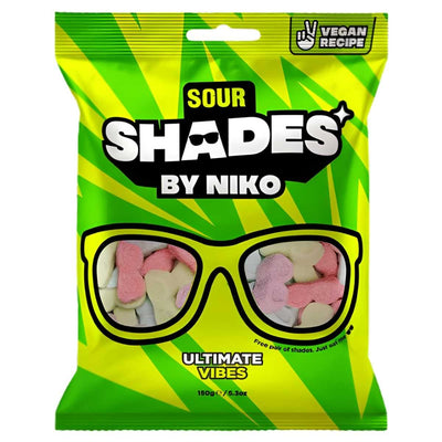 A bright green bag of "Shades - Ultimate Vibes - 150g" vegan sweets by Shades features sunglasses packed with colourful gummies and bold flavours.