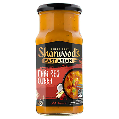 A 415g jar of Sharwood's Thai Red Curry brings authentic East Asian flavors, featuring curry, garlic, and chili, straight to your kitchen.
