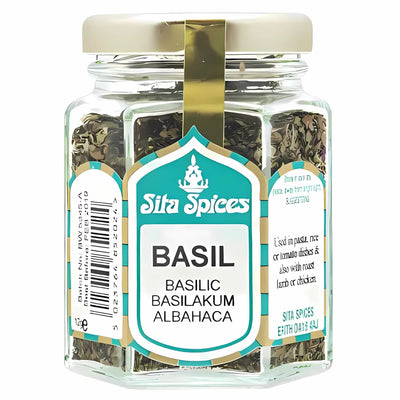 Sita Spices - Basil - 12g comes in a glass jar with a gold lid, featuring multilingual labels (English, Italian, German, Spanish), ideal for adding authentic Mediterranean flavor to your dishes.