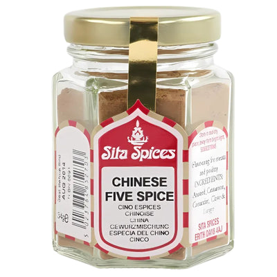 Sita Spices - Chinese Five Spice - 30g comes in a hexagonal glass jar with a gold lid and multilingual labeling, offering an aromatic blend that enhances the flavor of your dishes.