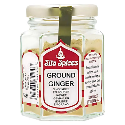 A 30g glass jar of Sita Spices Ground Ginger with a red and white label featuring product details in multiple languages.