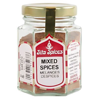 A glass jar with a gold lid labeled "Sita Spices - Mixed Spices - 30g" in English and French, containing premium blended brown spice powder.