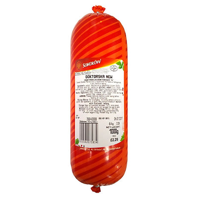 Sokolow - Doktorska Sausage - 1kg comes in a cylindrical package with a red striped wrapper and white label with product details and barcode; this cooked chicken sausage offers a premium mortadella-inspired flavor.