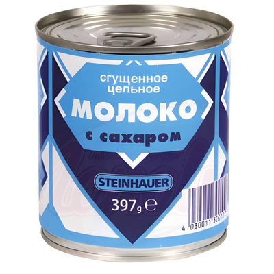 A 397g can of Steinhauer Condensed Milk features sweetened condensed milk and a blue geometric label with Russian text.