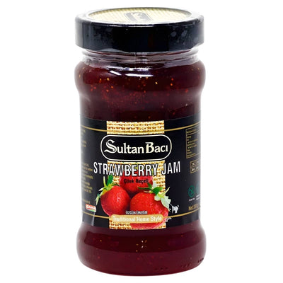 Sultan Baci - Strawberry Jam (380g) comes in a glass jar with a black and gold label adorned with strawberries, offering an authentic taste perfect for fans of traditional Turkish jam.