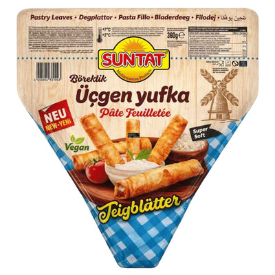 Suntat Ucgen Yufka 360g comes in a triangle-shaped pack with images of pastry rolls, tomatoes, and dip. The packaging displays product info in several languages, ideal for preparing authentic Turkish yufka dishes.