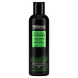 Black bottle of TRESemme - PRO Style Tech Replenish & Cleanse Shampoo - 300ml with a green label featuring product information, vitamin complex details, and a line graphic at the base.