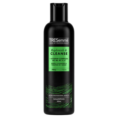 Black bottle of TRESemme - PRO Style Tech Replenish & Cleanse Shampoo - 300ml with a green label featuring product information, vitamin complex details, and a line graphic at the base.