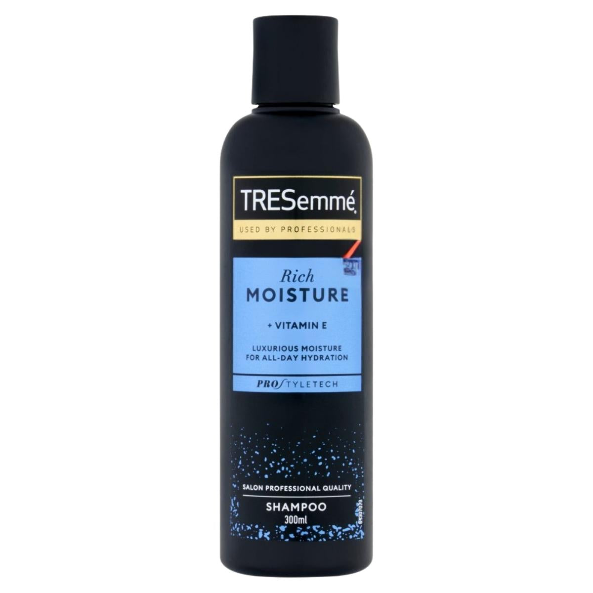 A 300ml bottle of TRESemme Rich Moisture Shampoo, featuring a blue label and black cap, provides hydrating care with Vitamin E.