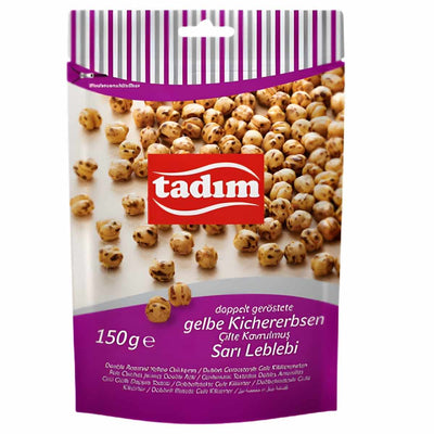 A 150g pack of tadim Double Roasted Yellow Chickpeas, a crunchy, nutty snack. The packaging shows chickpeas and features product info in German and Turkish.