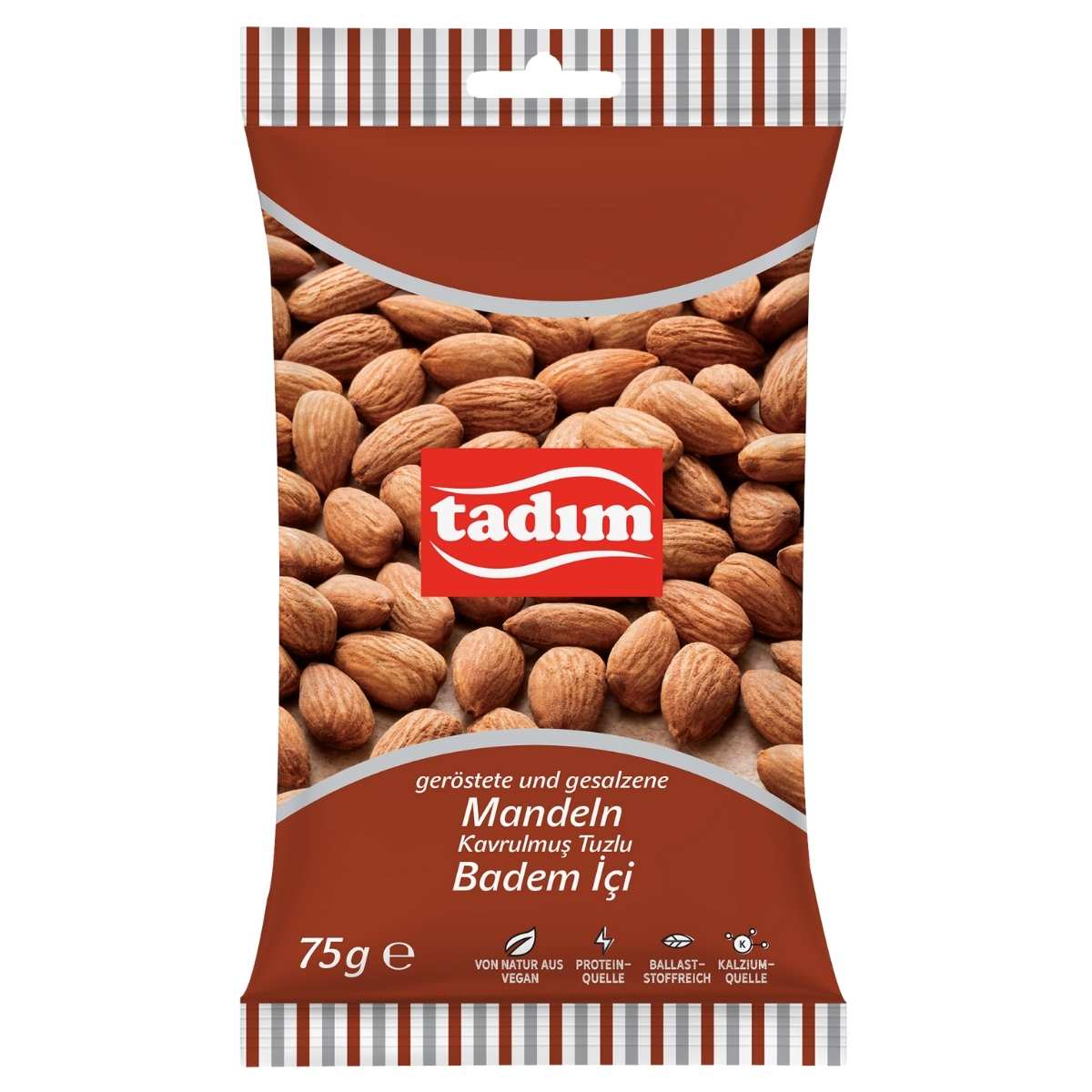 A 75g pack of tadim Roasted & Salted Almond Kernels, labeled in German and Turkish, highlights this tasty snack with tempting almonds shown on the packaging.