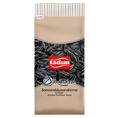 A beige and black 270g Tadim package of roasted unsalted sunflower seeds, showing an image of the seeds and labeled in German.