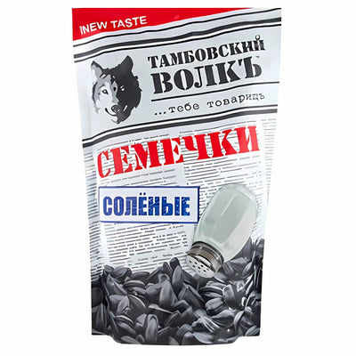 A 200g pack of Tambov Wolf salted and roasted sunflower seeds, featuring a wolf logo, black seeds, a salt shaker, and Russian text on the packaging.